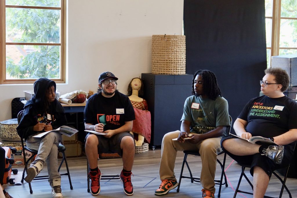 Pictured: Four of Open Doors' youth faciliators-in-training participate in a larger Restorative Justice Circle