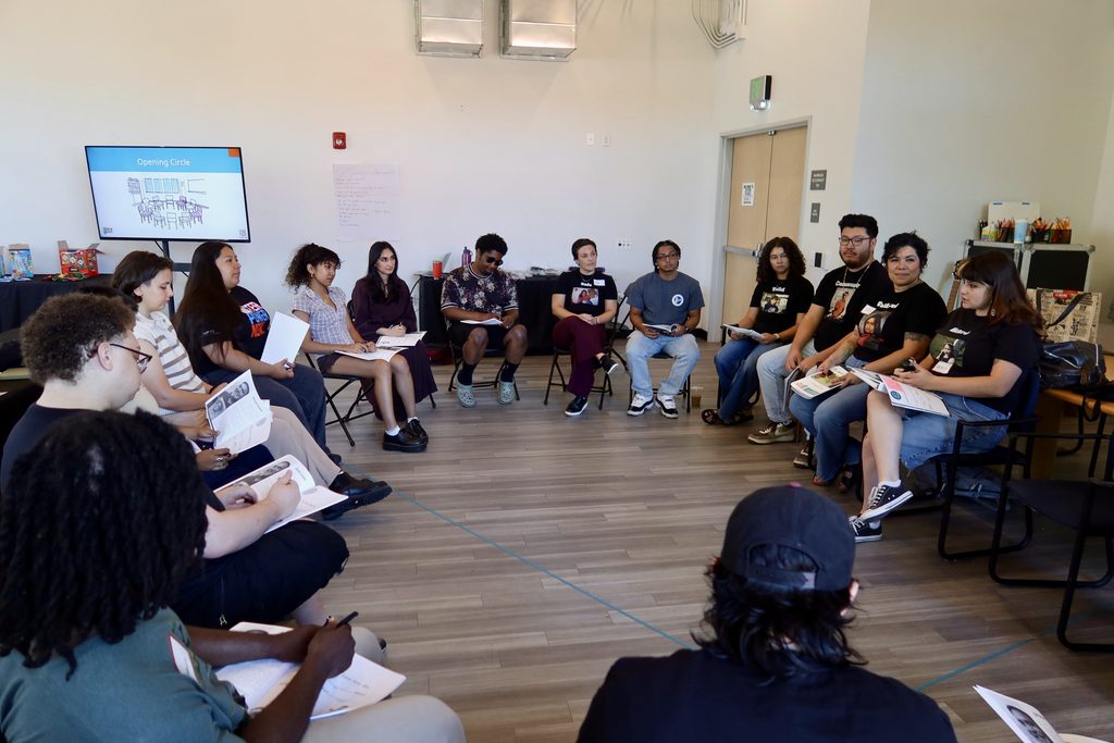 Pictured: Open Doors faciliators and a group of youth faciliators-in-training participate in a Restorative Justice Circle as part of the Core Training experience